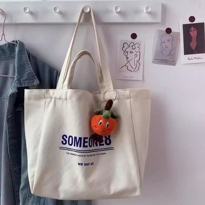 Benutzerdefiniertes Logo akzeptabel Doppelgriff Baumwoll-Tote-Tasche für Tennisracket im westlichen Stil