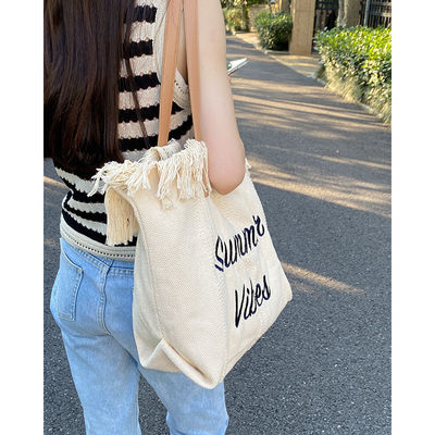 Stylische Handtasche aus Leinwand mit Straußmuster, ideal für ungezwungene Sommerausflüge und Shopping