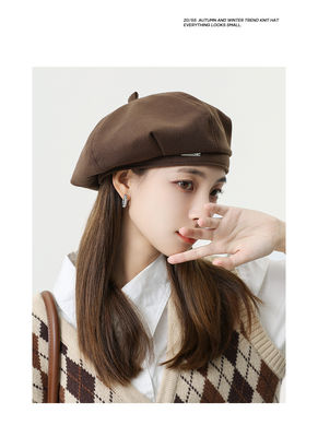 Koreanische Version von Herbst- und Winterwollmetall-Marke-Beret für das tägliche Leben von Kindern