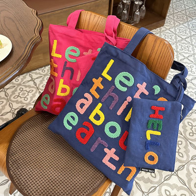 Farbenfrohe Brodurenbriefe Leinwand-Schultertasche Funktionelle und modische Wahl