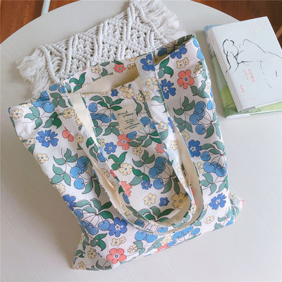 Ich kaufe mir einen Custom Logo Tote Bag aus Baumwolle.