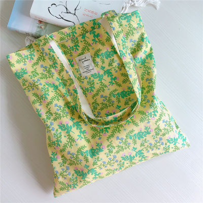 Ich kaufe mir einen Custom Logo Tote Bag aus Baumwolle.