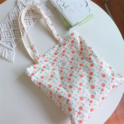 Ich kaufe mir einen Custom Logo Tote Bag aus Baumwolle.