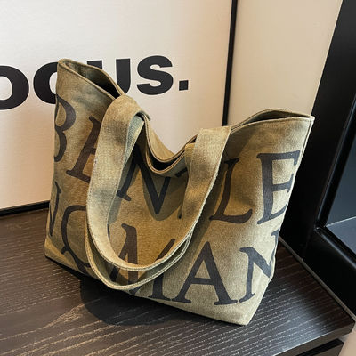 Handheld Style Frauen Explosion Tote Tasche mit trendigen Buchstaben Druck und große Kapazität