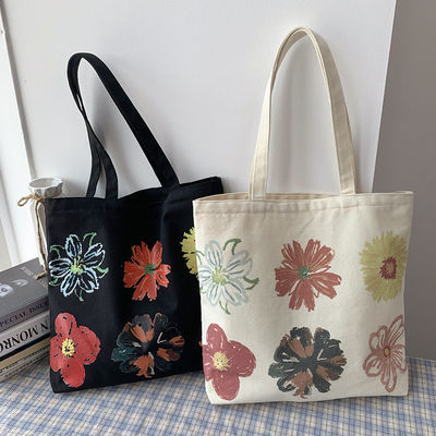 Moderne Handtasche für Frauen mit Blumendruck