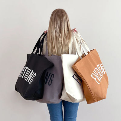 Übergroße Leinwand Frauen Hand Sport Fitness-Tasche Personalisiertes Logo 2022 Briefdruck Tote-Tasche