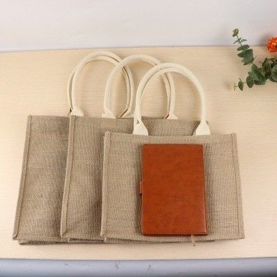 Umweltfreundliche Jute-Einkaufstaschen mit individuell gedrucktem Logo und Ledergriffe