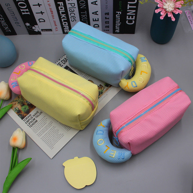Akzeptable OEM/ODM Make-up-Tasche Portable Cartoon Toiletterei Waffel Kosmetik-Tasche für Mädchen