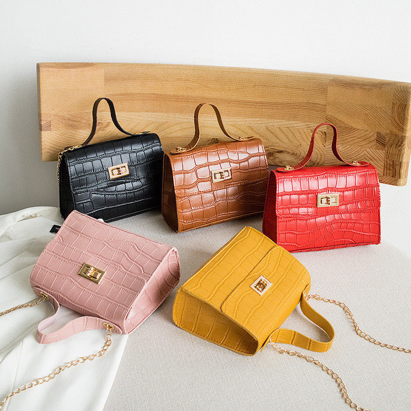 Handtasche in Krokodilfarben mit Reißverschluss und Luxusdesign