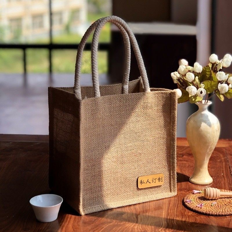 Umweltfreundliche Jute-Einkaufstaschen mit individuell gedrucktem Logo und Ledergriffe
